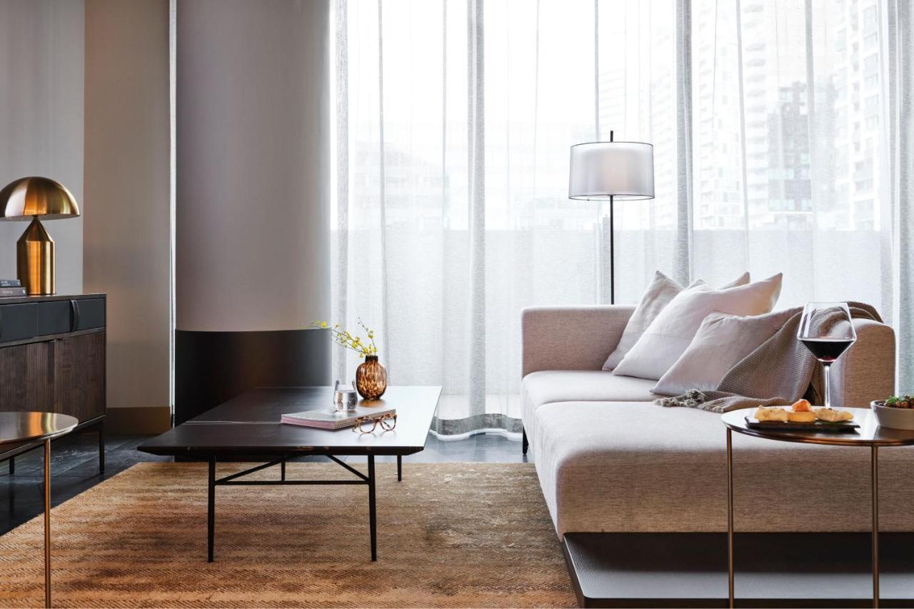 Melbourne Marriott Hotel Docklands Екстер'єр фото A living room in a private house